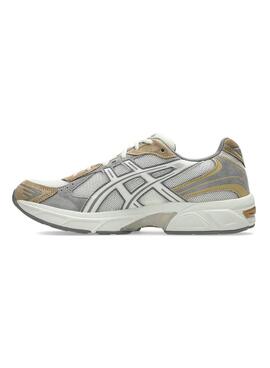 Turnschuhe Asics GEL-1130 weiß und beige für Herren und Damen.