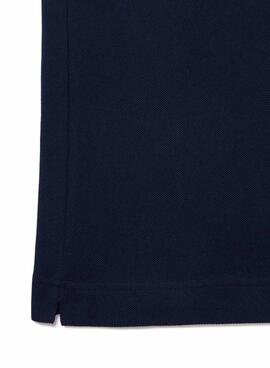 Polo Lacoste L.12.12 mit marineblauem Logo-Druck für Herren und Damen.