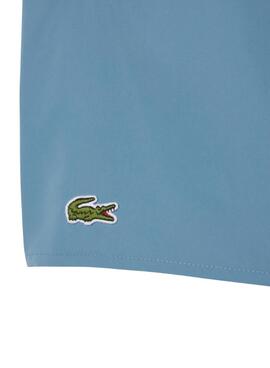 Schnelltrocknende blaue Lacoste-Badehose für Herren