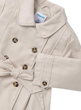 Regenmantel Mayoral in Beige mit Schleife für Mädchen.