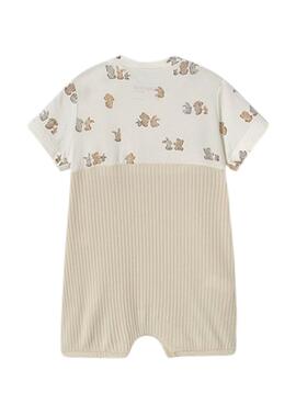 Strampler Mayoral in beige mit aufgesetzter Latzhose für Babys.