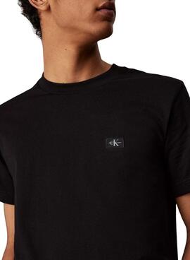 T-Shirt Calvin Klein Jeans Woven Label schwarz für Herren.