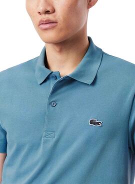 Grundlegendes Lacoste-Poloshirt mit blauen Rippenbündchen für Herren.