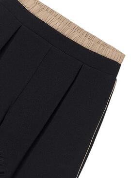 Schwarze weite Hose von Mayoral für Mädchen.