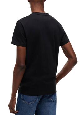 T-shirt Tommy Jeans Sign Chest Slim in Schwarz für Herren
