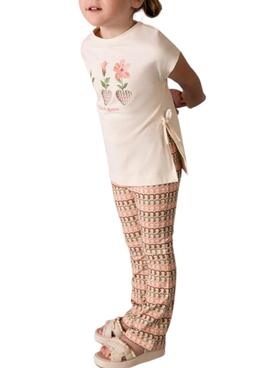 Orange Blumenensemble mit Muster für Mädchen.