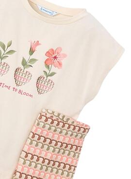 Orange Blumenensemble mit Muster für Mädchen.